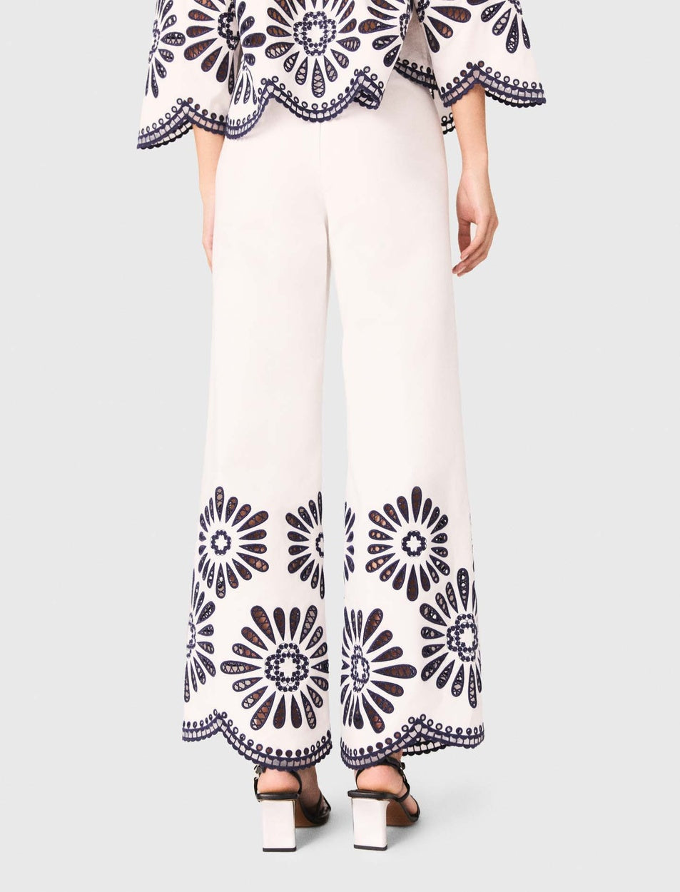 Trousers with crochet detail