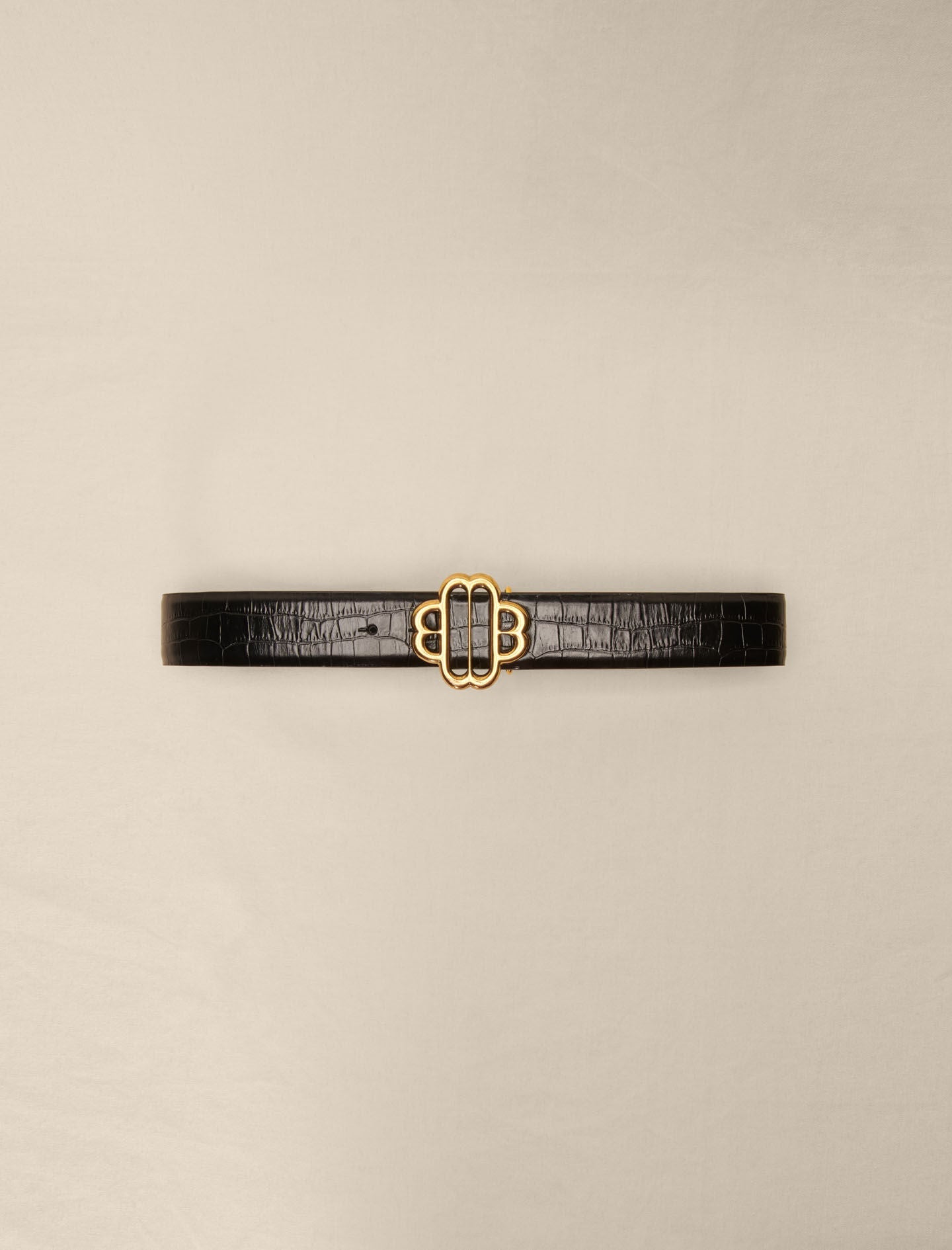 Black featured-leather belt with clover buckle