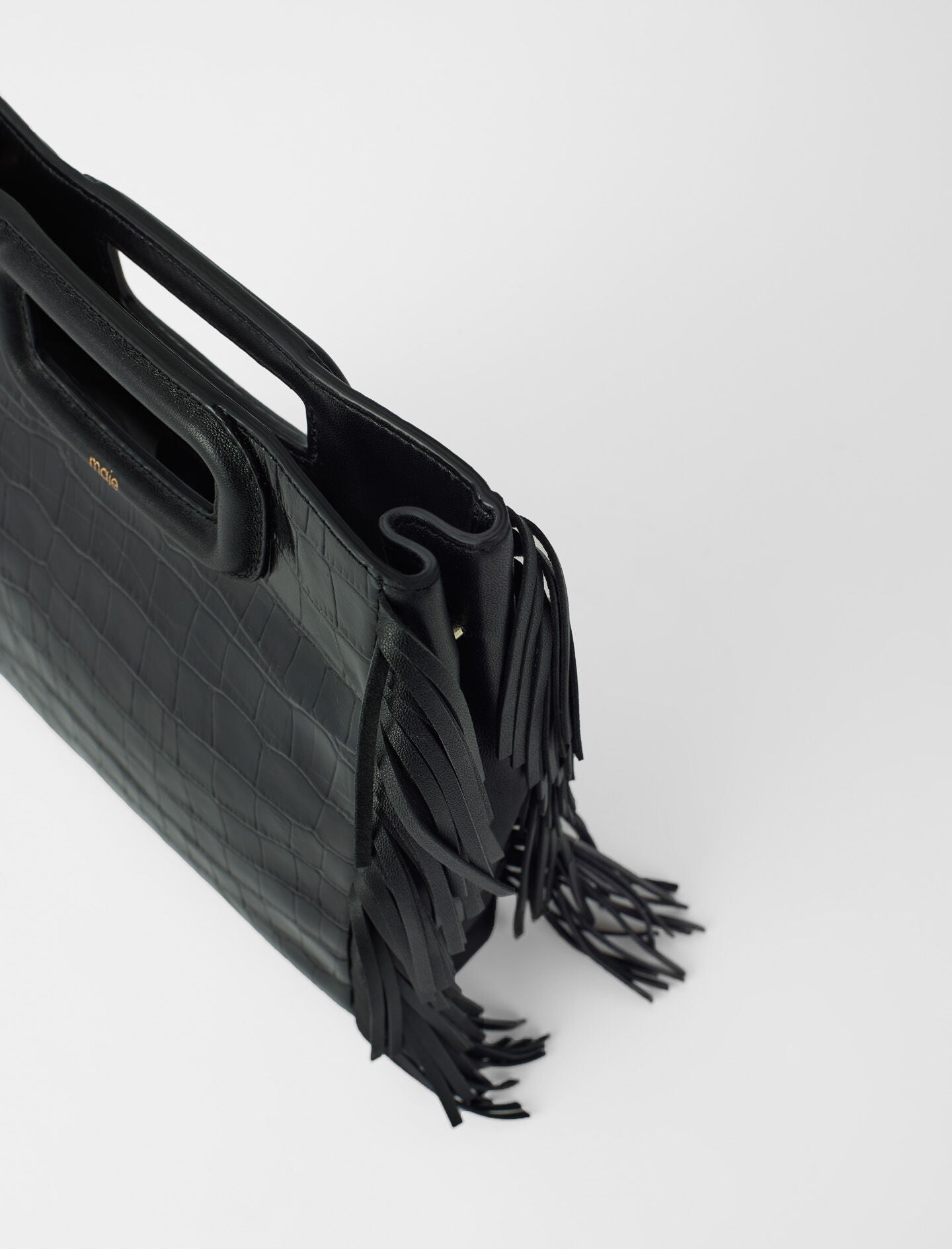 Black-fringed leather m bag