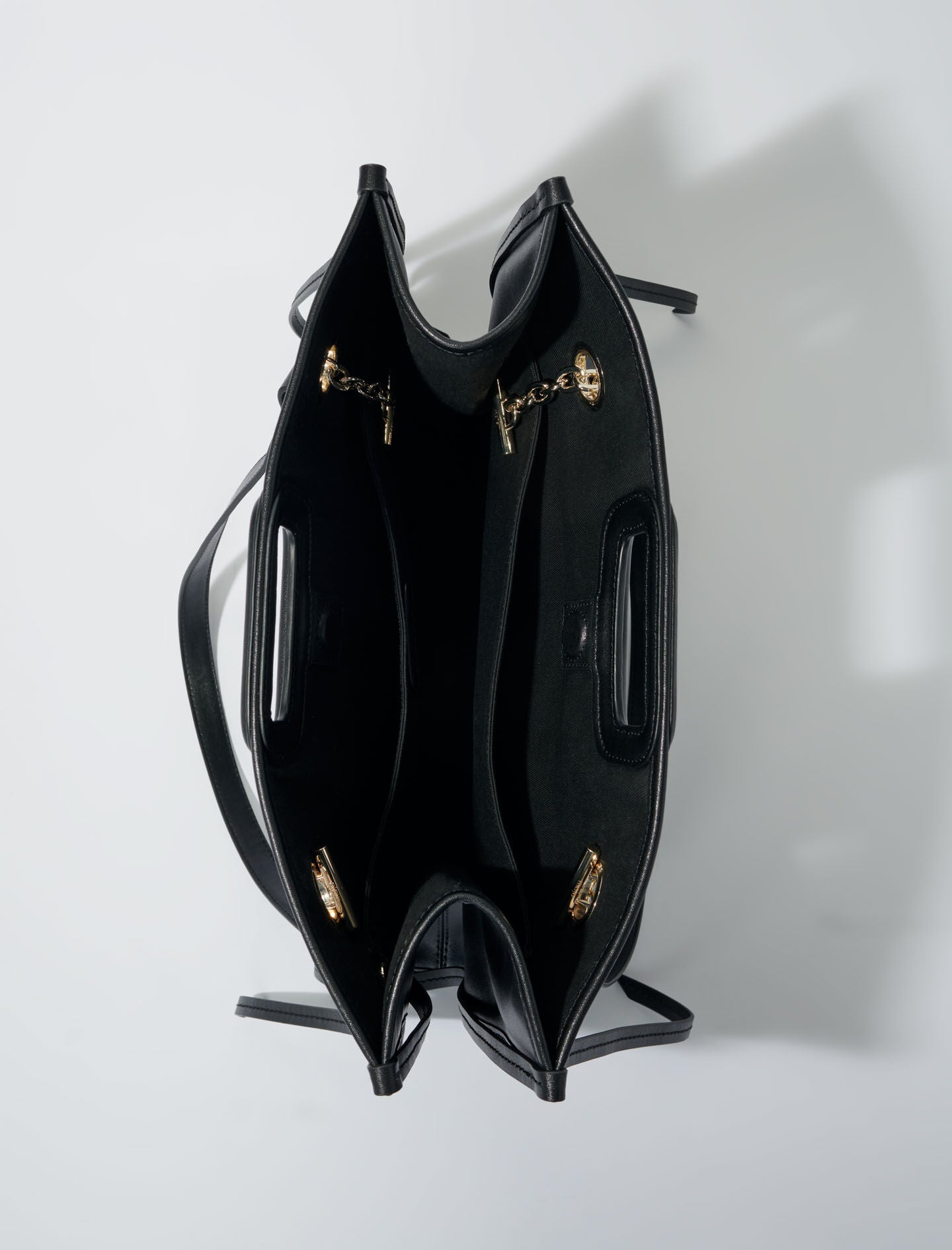 Black-fringed leather tote bag