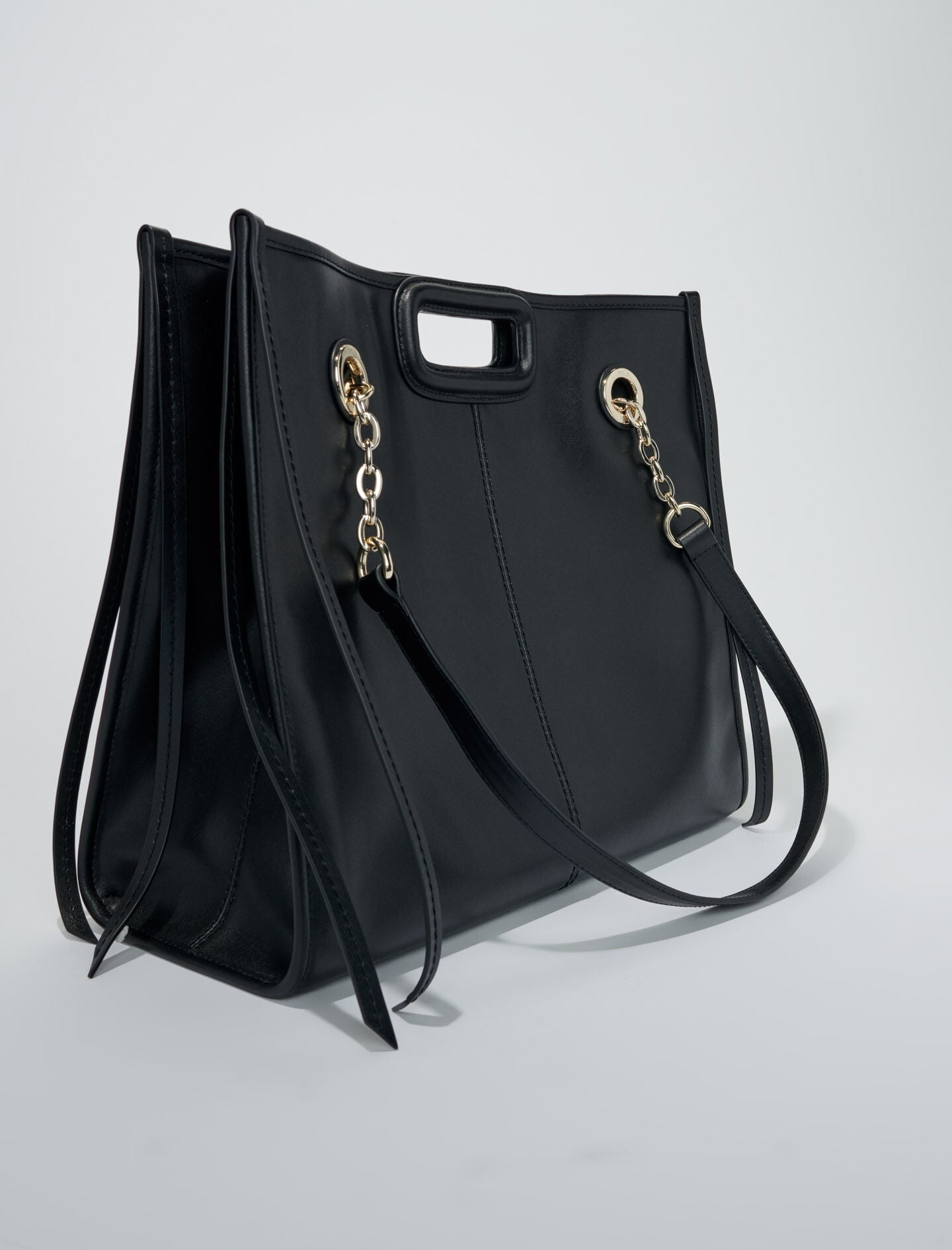 Black-featured-fringed leather tote bag