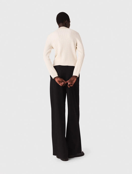 Knit polo shirt with rhinestone collar