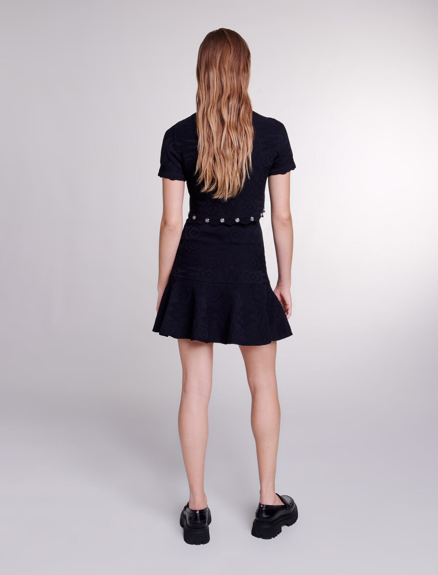 Black-trompe l'œil knit mini dress