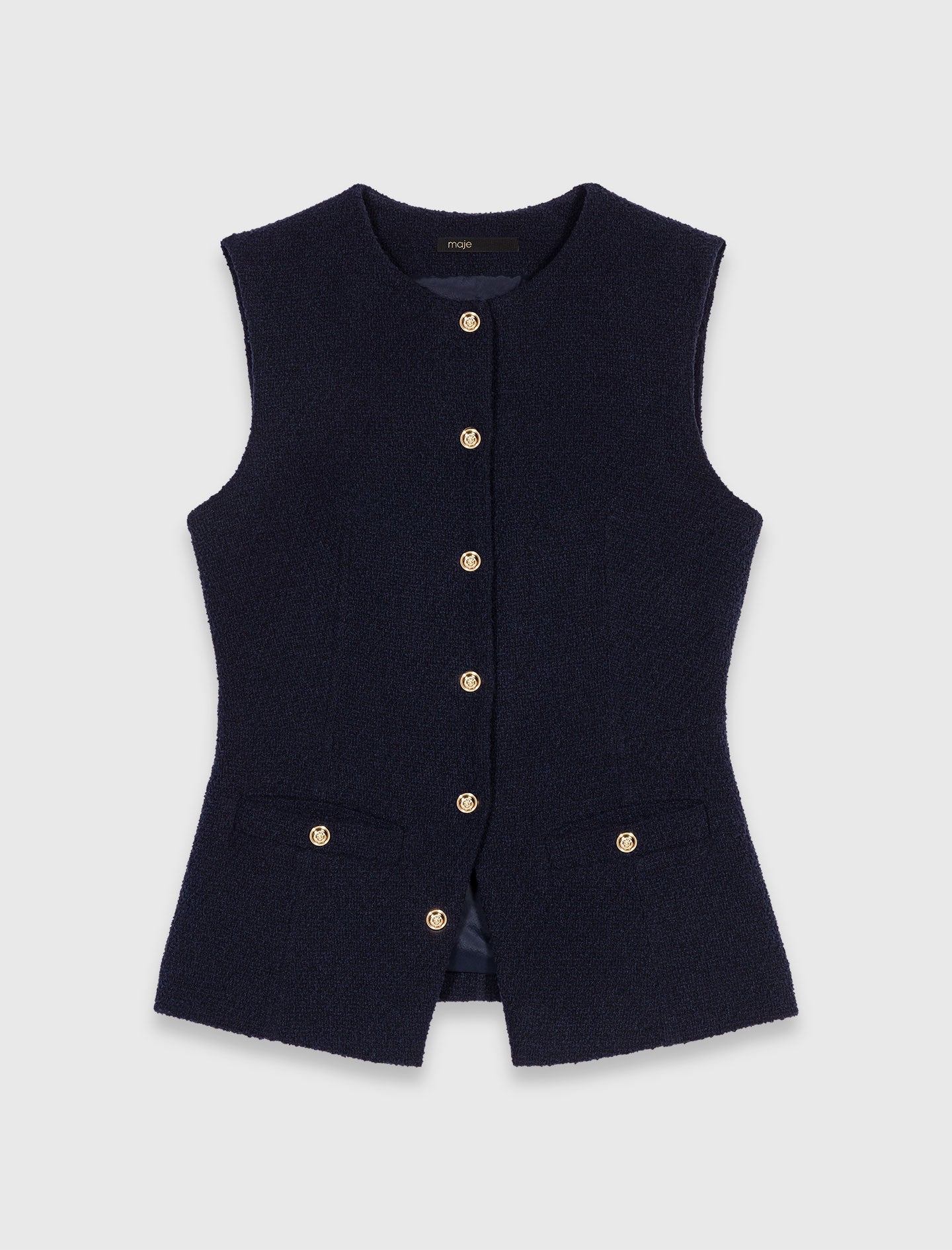 Long sleeveless tweed jacket