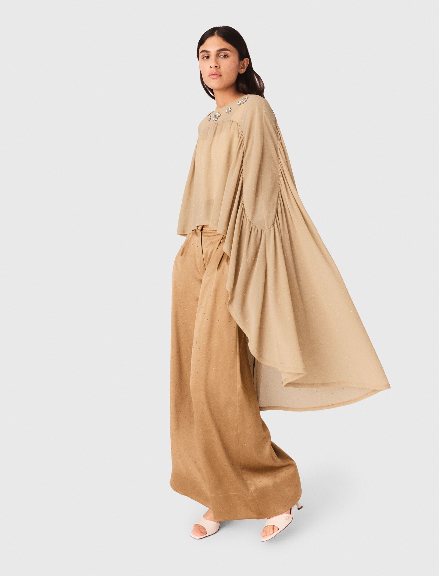 Cape top with jewel collar