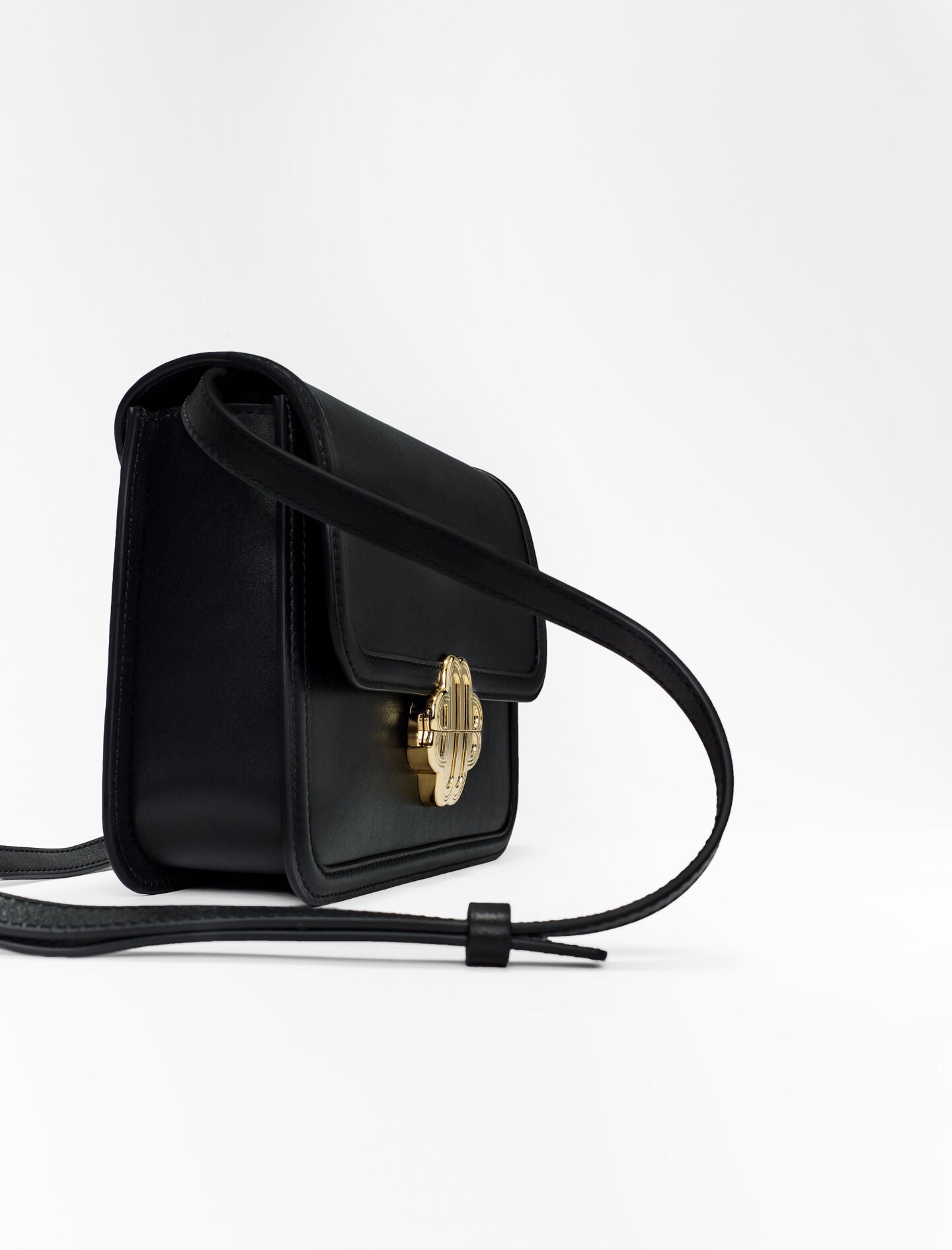 Black Leather bag with clover clasp